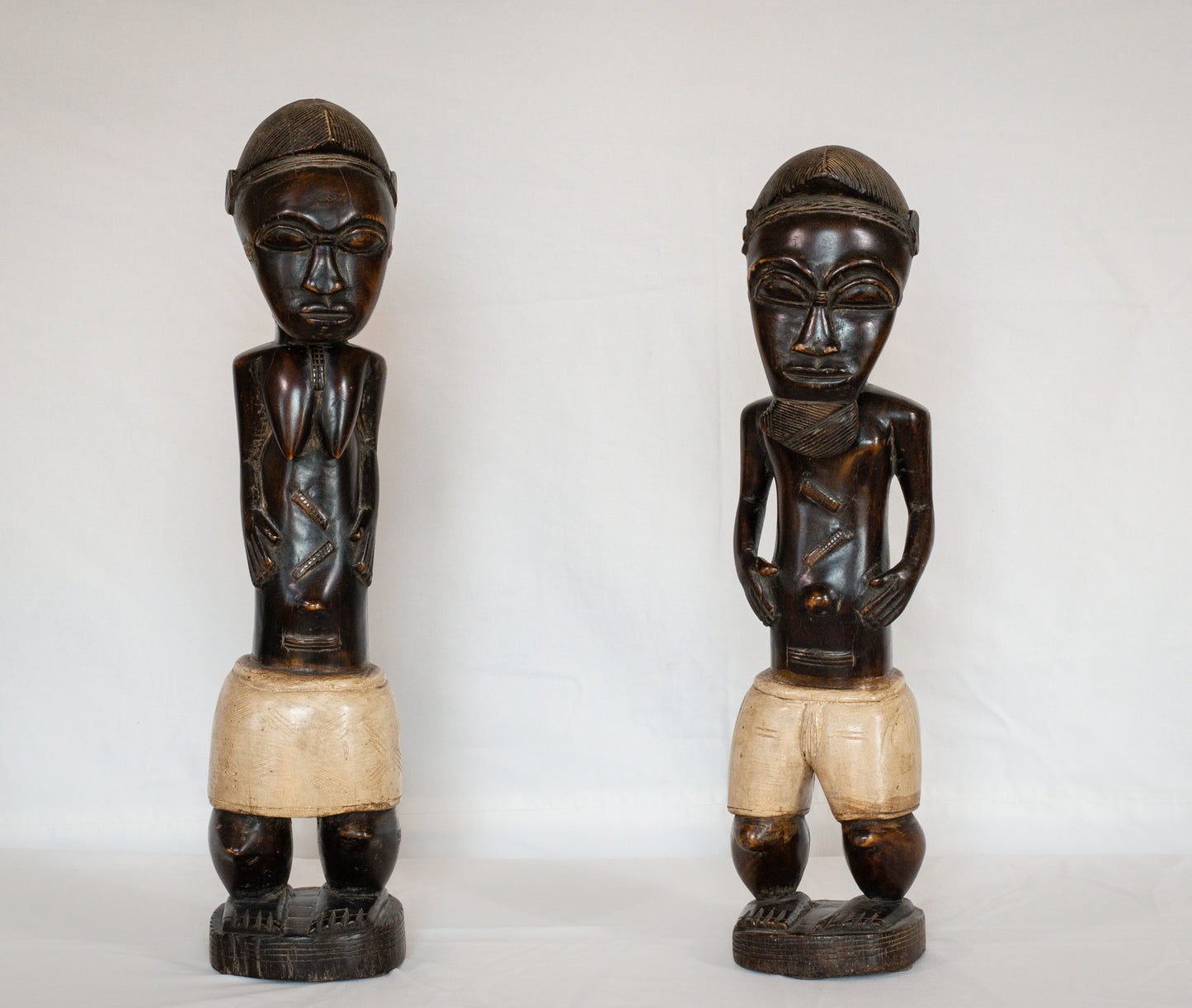 Two Sculptures of men