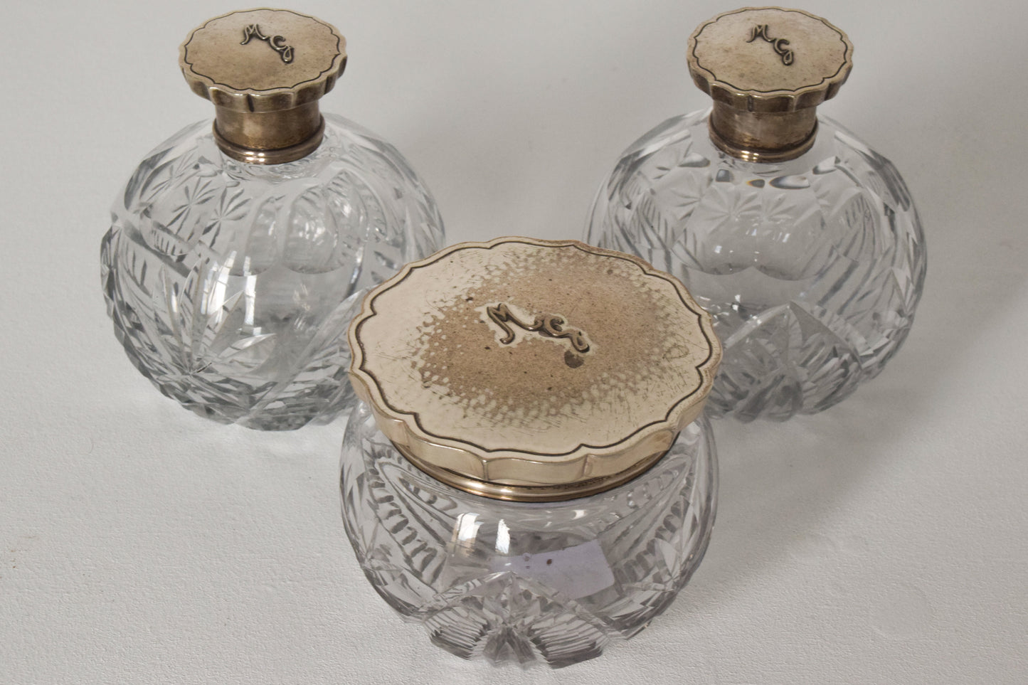 Three Silver Topped Cut Glass Bottles - Modern Decorative