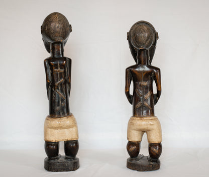 Two Sculptures of men