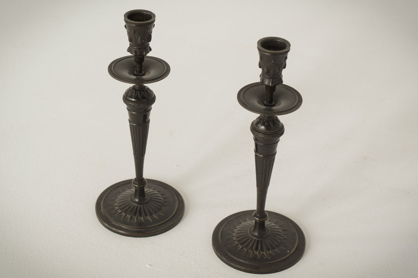 A Classic Pair of Bronze Candlesticks_2