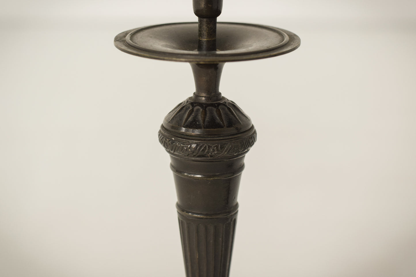 A Classic Pair of Bronze Candlesticks_Detail