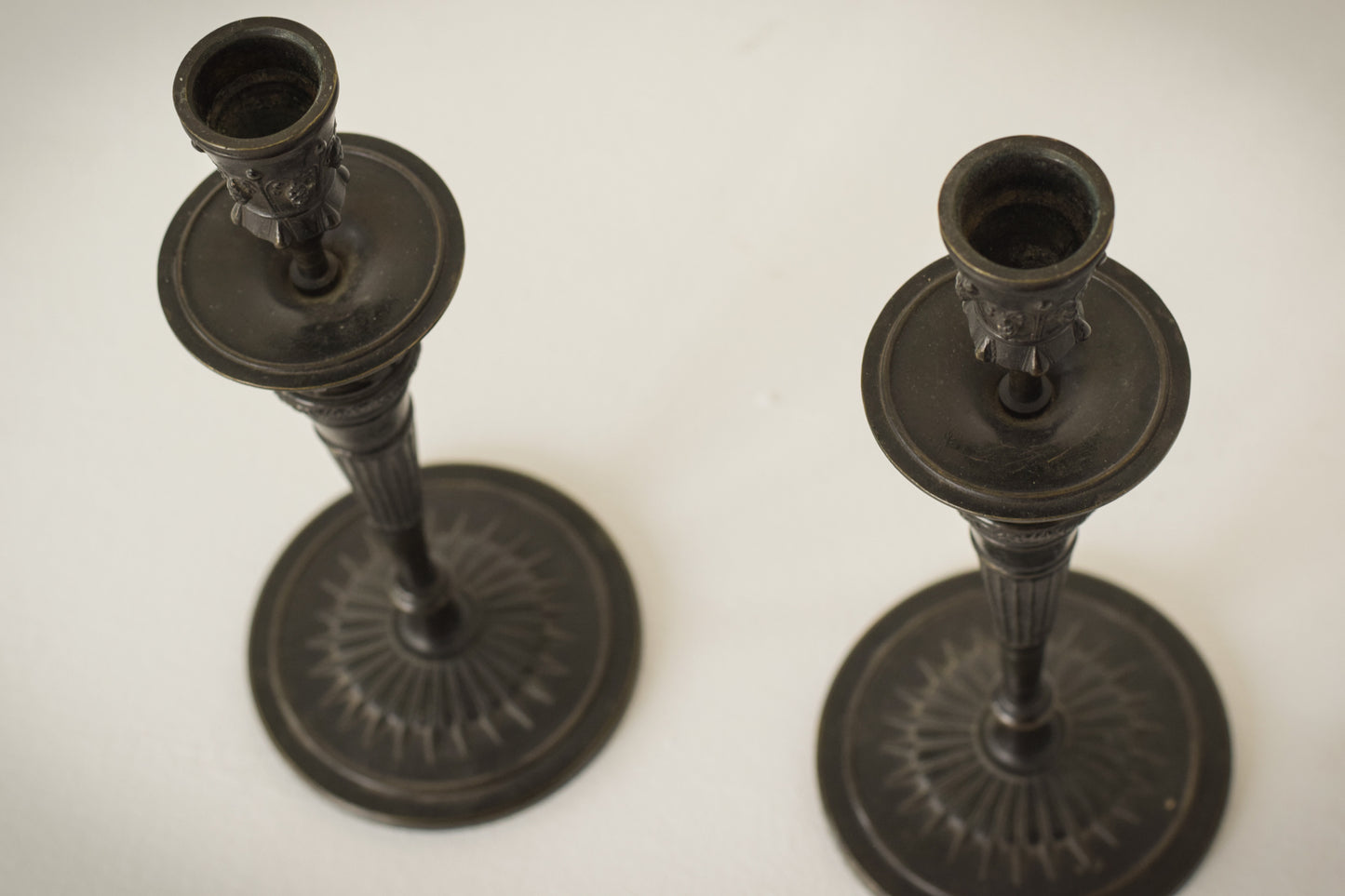 A Classic Pair of Bronze Candlesticks_4