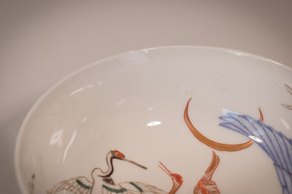 Pair of oriental Bowls with cranes