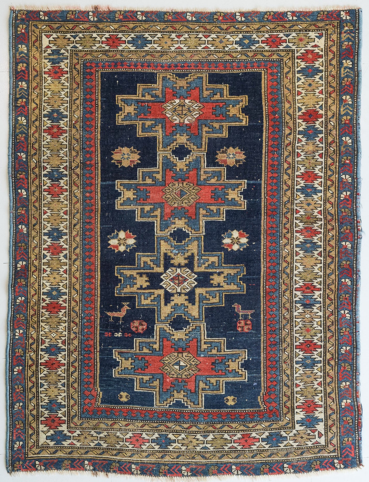 Handwoven - Blue Ground Persian Rug with Bird-like Figures