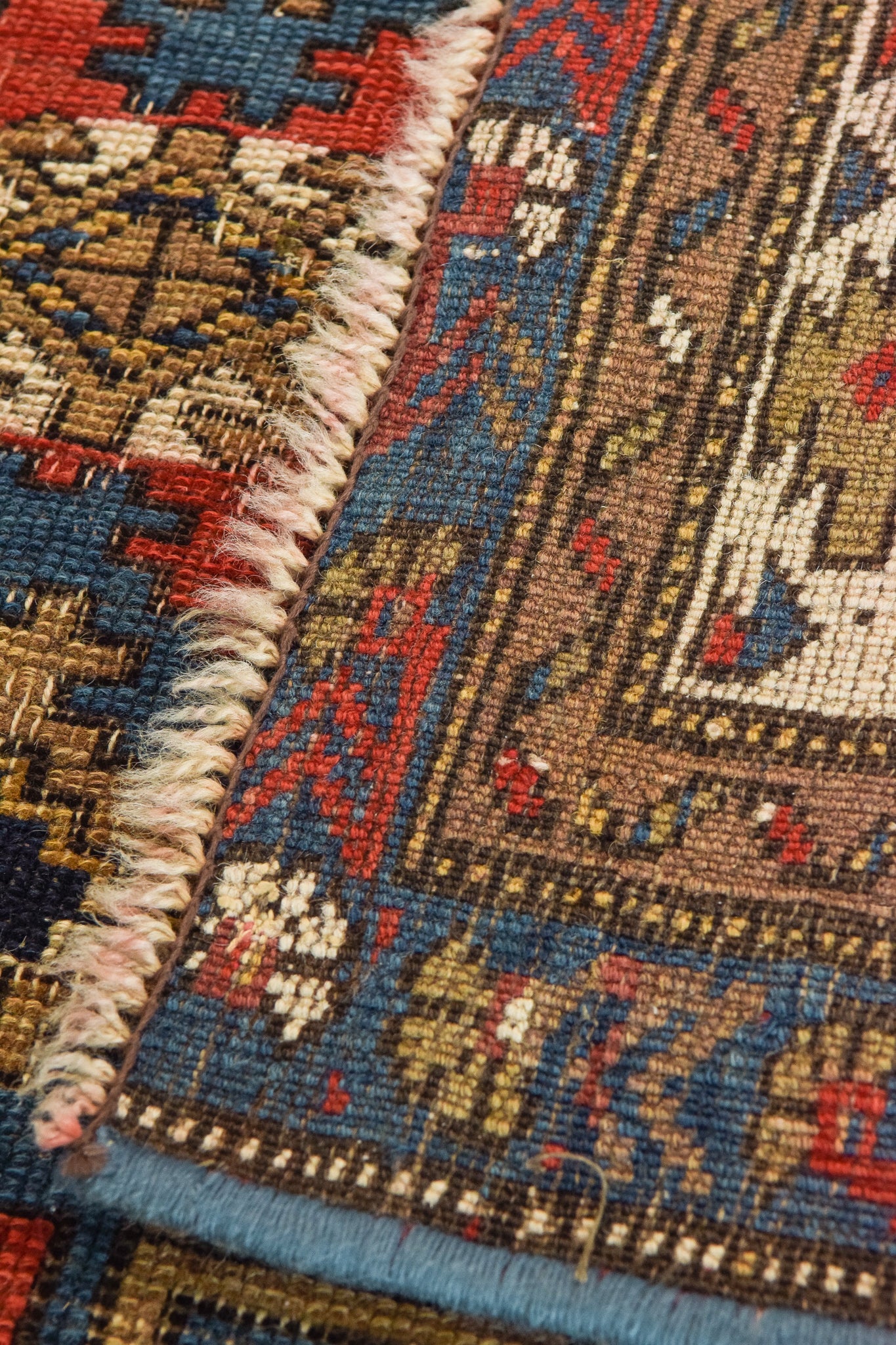 Handwoven Blue Ground Persian Rug with Bird-like Figures