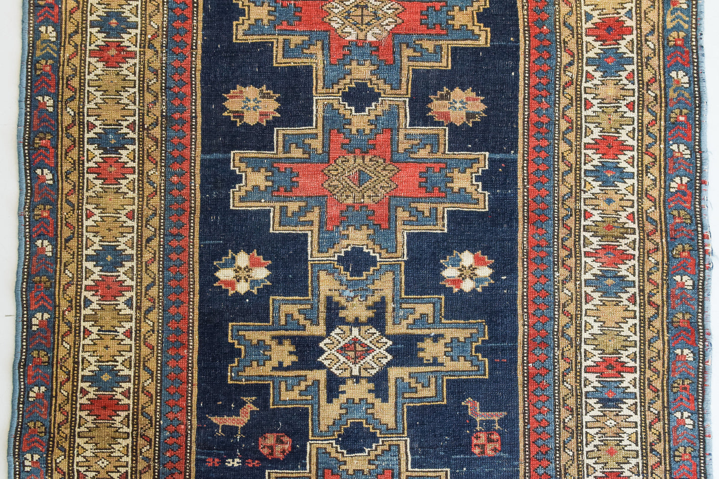 Handwoven - Blue Ground Persian Rug with Bird-like Figures