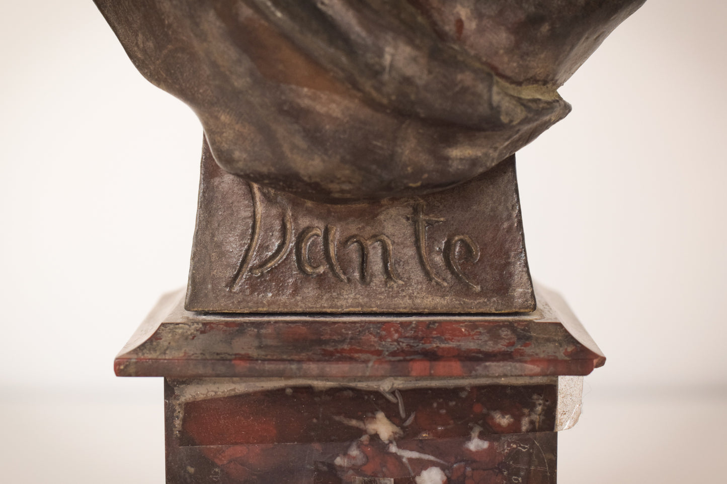 Bronzed bust with marble base of Dante by Giuseppe Moretti