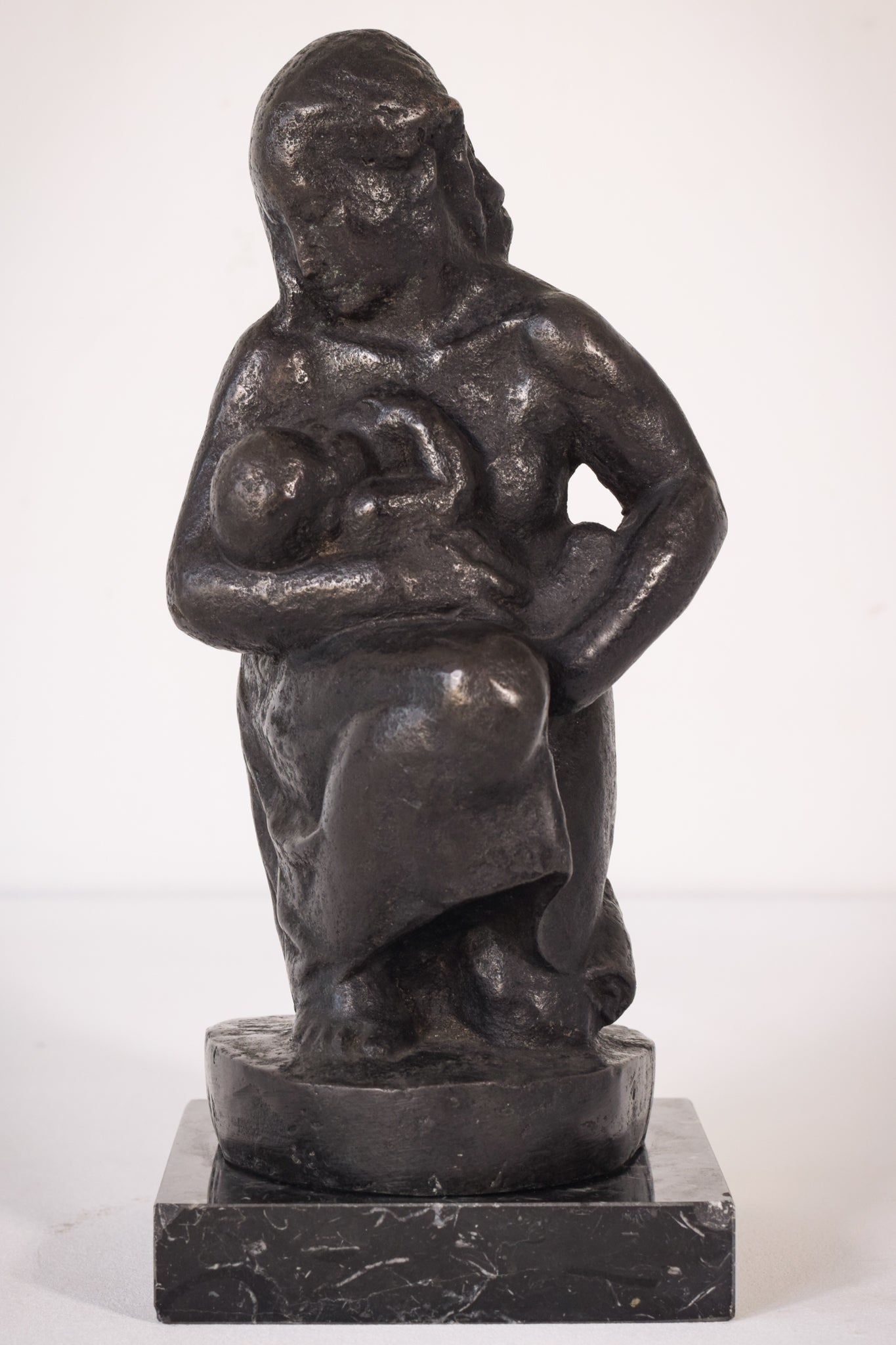 Bronze Mother Feeding Child by Manuel Martinez Hugué, 1935