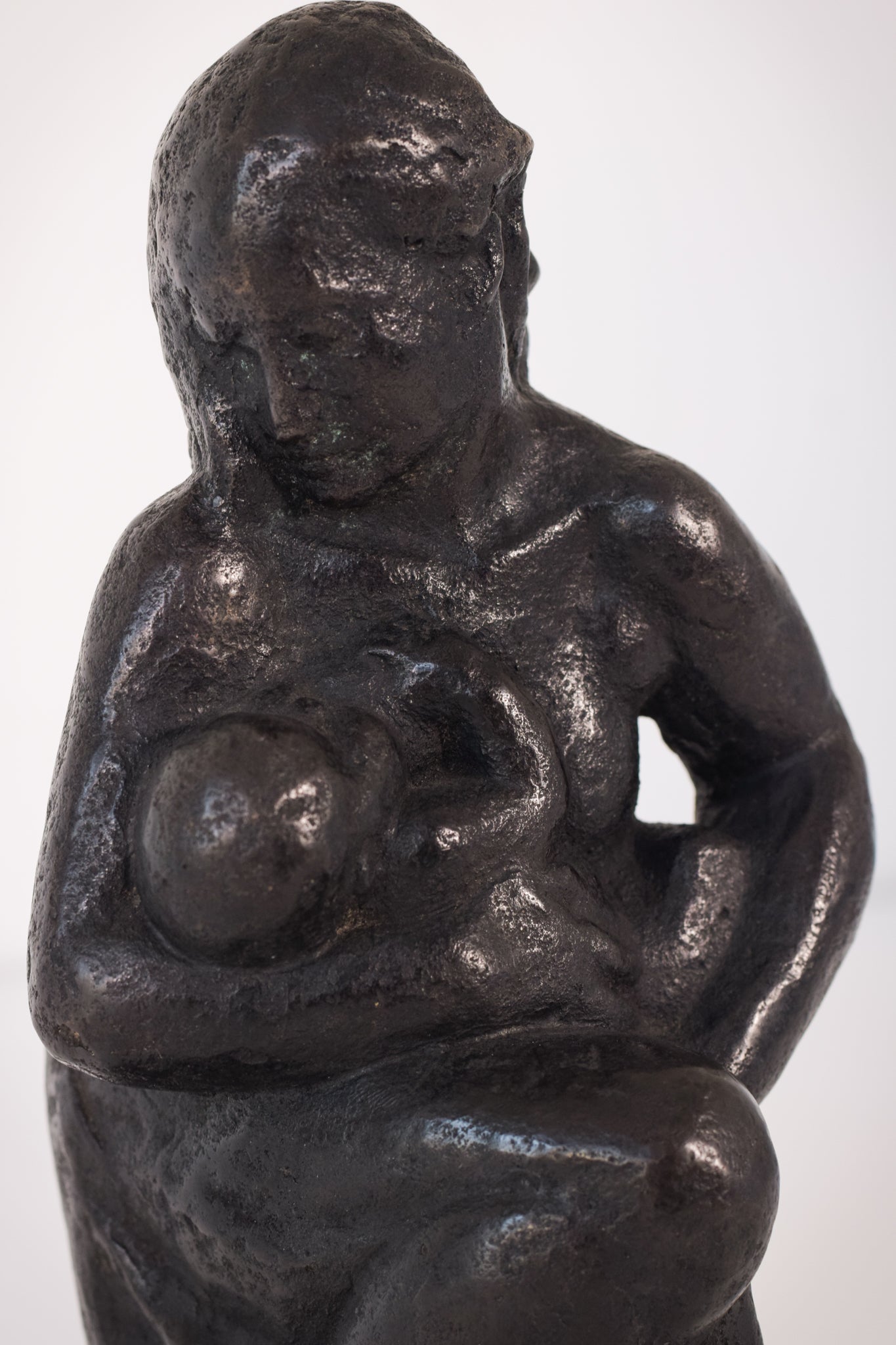 Bronze Mother Feeding Child by Manuel Martinez Hugué, 1935