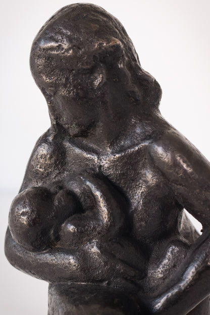Bronze Mother Feeding Child by Manuel Martinez Hugué, 1935