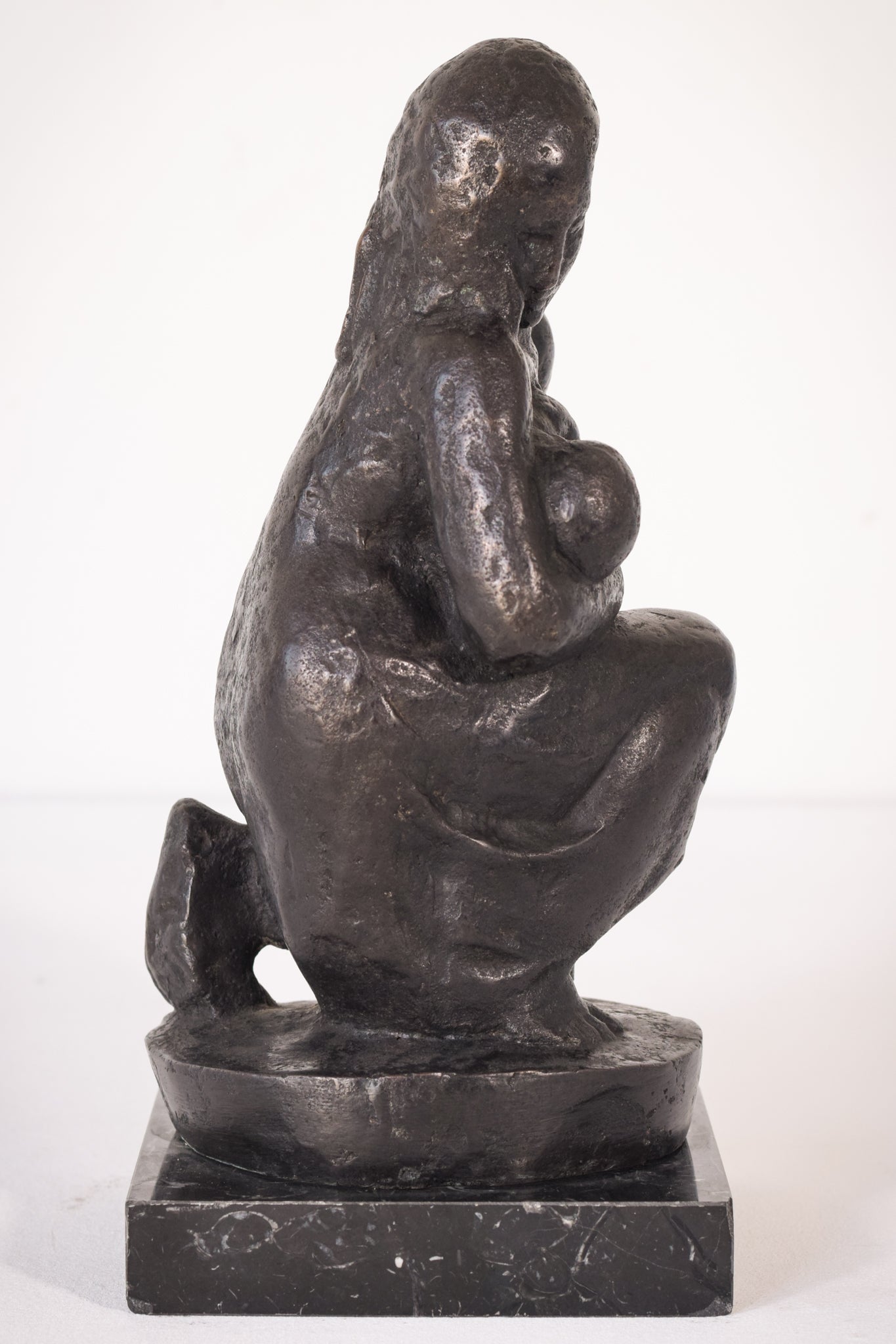 Bronze Mother Feeding Child by Manuel Martinez Hugué, 1935