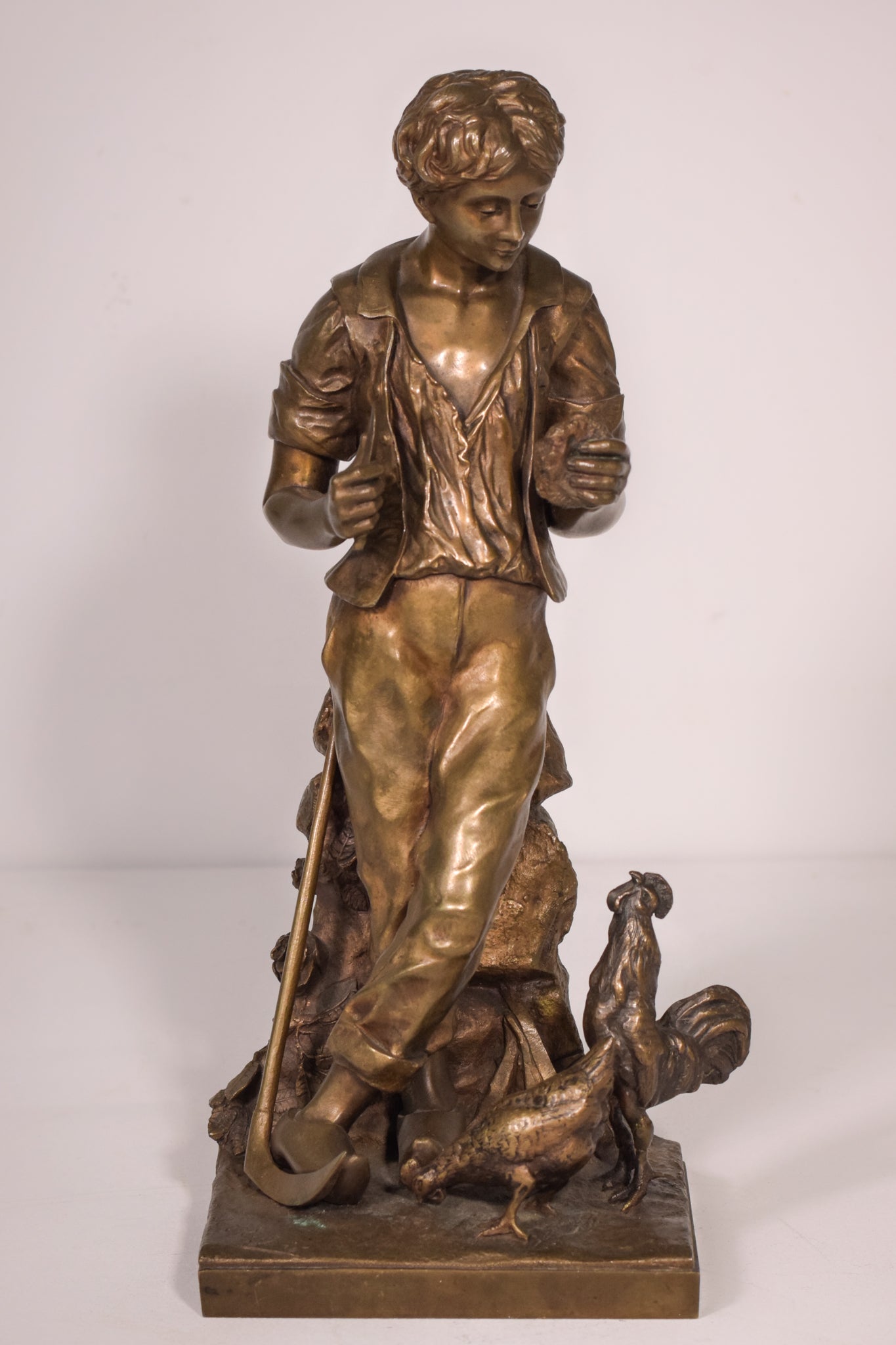 Bronze of a boy with chickens Signed A. Espié