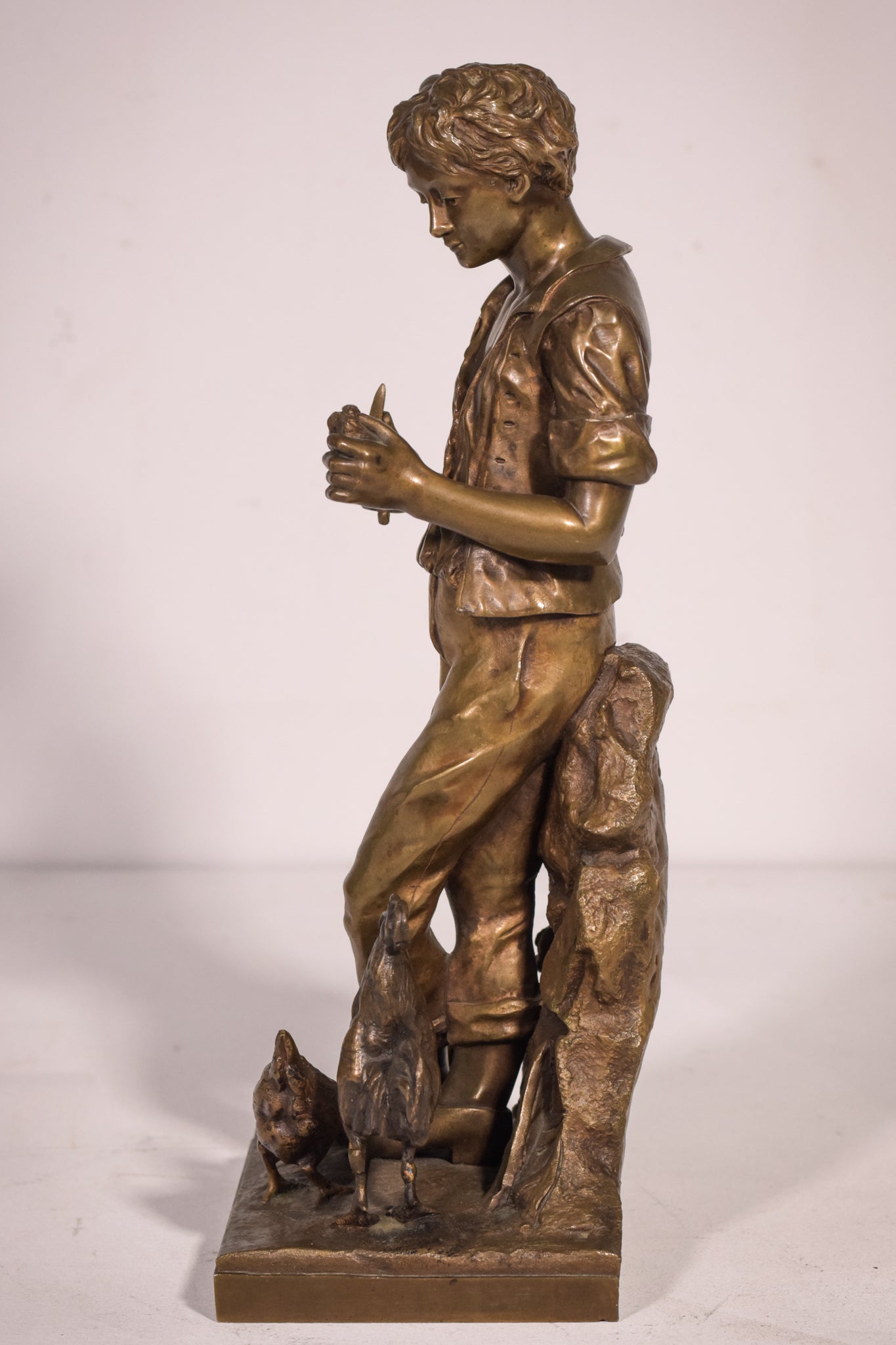 Bronze of a boy with chickens Signed A. Espié