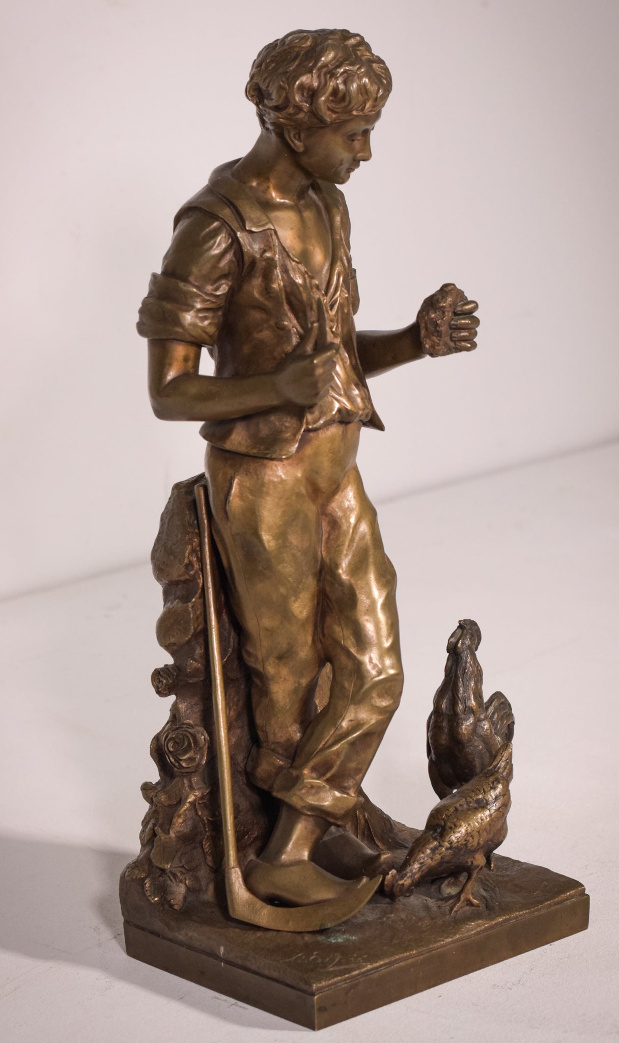 Bronze of a boy with chickens Signed A. Espié