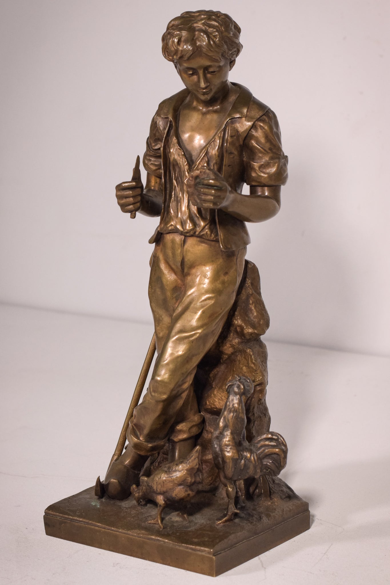 Bronze of a boy with chickens Signed A. Espié