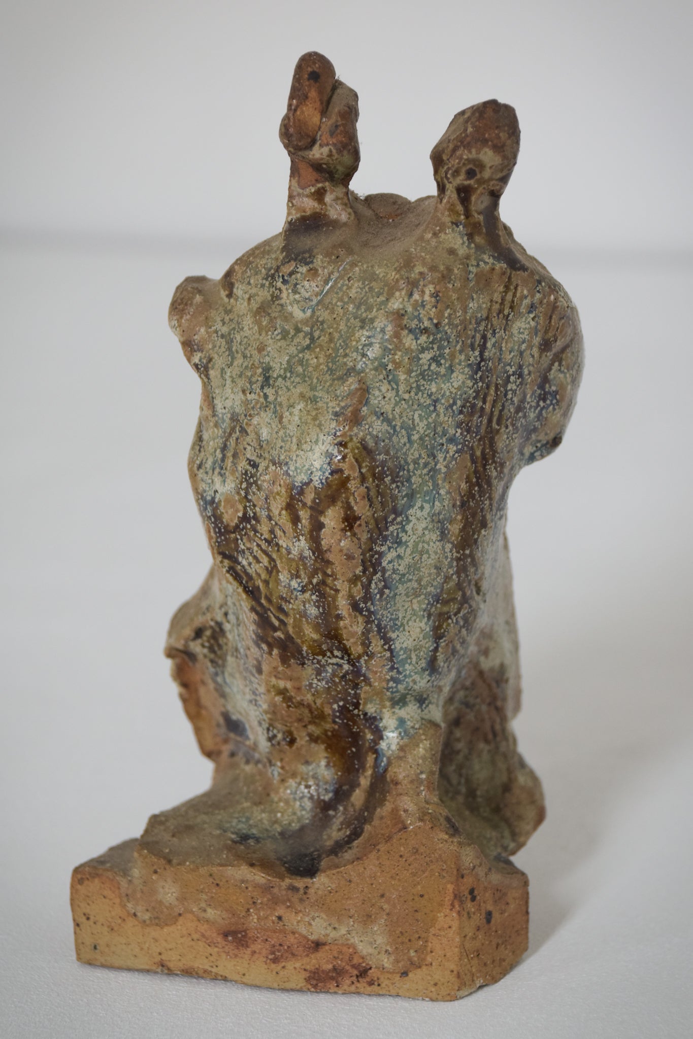 Sculpture of a Figure Playing an Instrument in an Abstract Style_Back 2