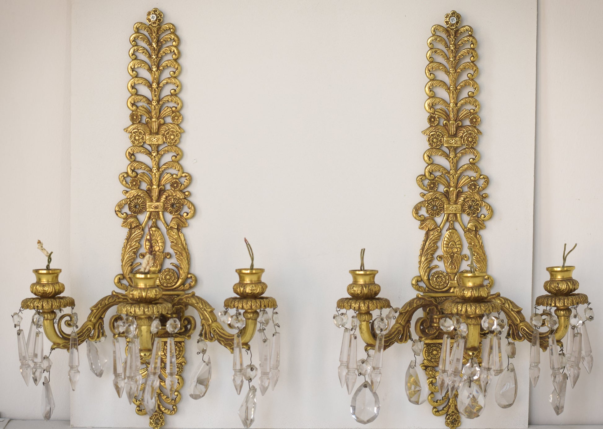 Two Golden Wall-Mounted Chandeliers
