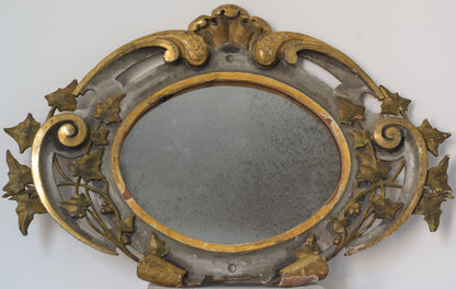 Antique Carved Gilded and Polychrome Oval Mirror