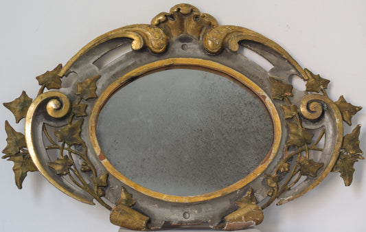 Espejo antiguo tallado dorado y policromado ovalado